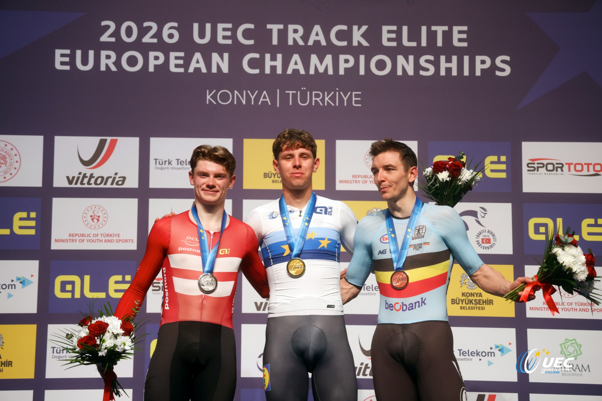 O pódio da Corrida por Pontos masculina com Conrad Haugsted, Tim Torn Teutenberg e Jasper de Buyst